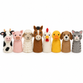 Eight wool felt farm animal finger puppets in a neat row on white
