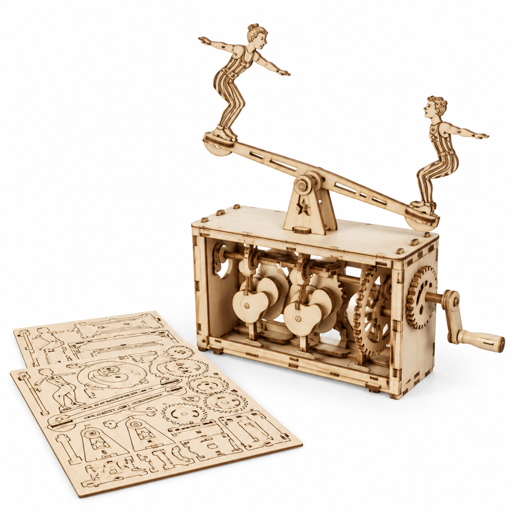 Assembled laser-cut wooden automaton with two acrobats on a seesaw beside unbuilt wood sheets, on white