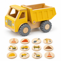 Chunky yellow wooden dump truck beside twelve round construction picture tiles on white
