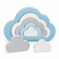 Sky-blue birch plywood board with five nested white, grey and pale blue cloud puzzle pieces, on white